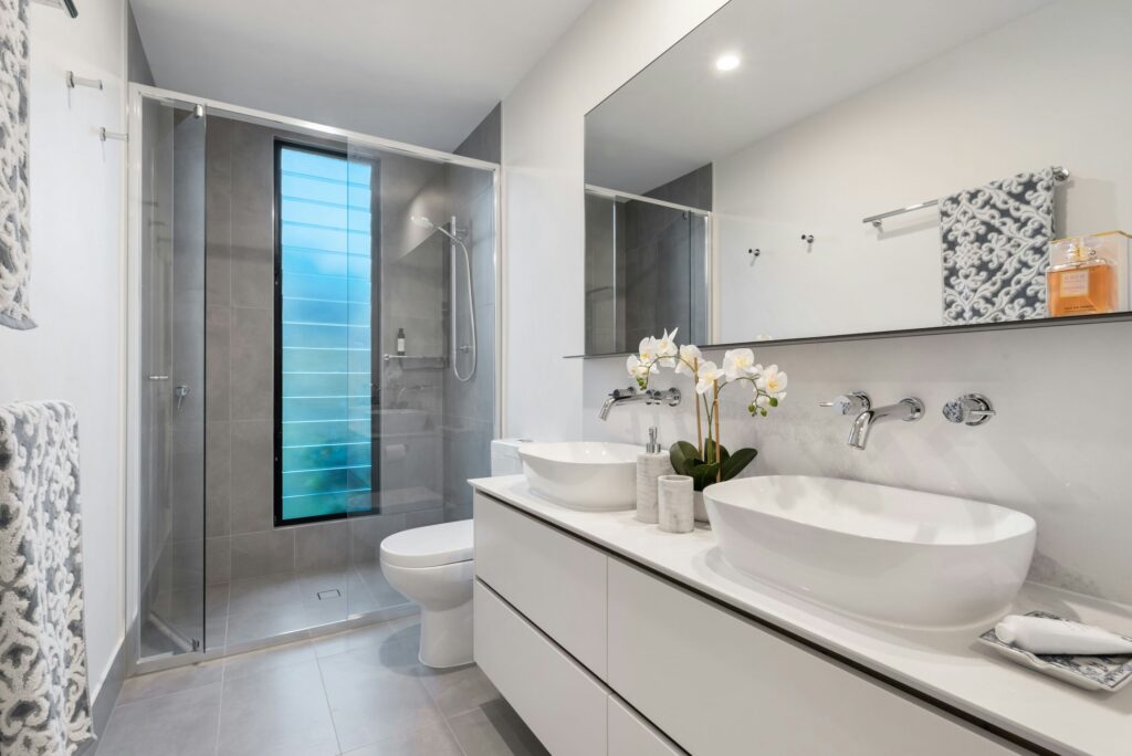 Stylish bathroom featuring a glass shower and elegant fixtures in Shelby.