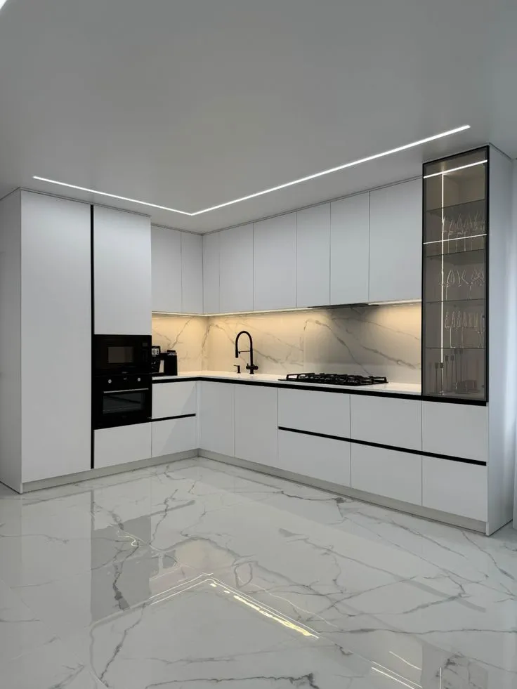 Bright kitchen remodel featuring white cabinets and stainless steel in Franklin City.